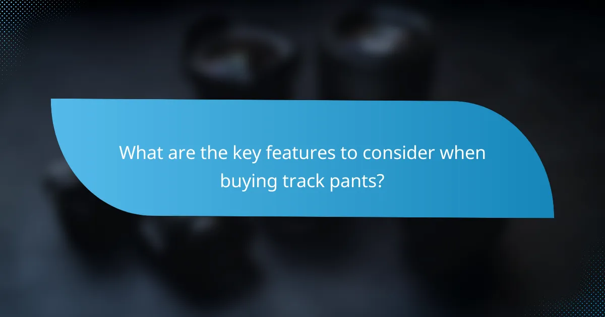 What are the key features to consider when buying track pants?